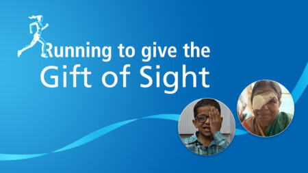 A blue banner with the words "Running to give the Gift of Sight" across it.
